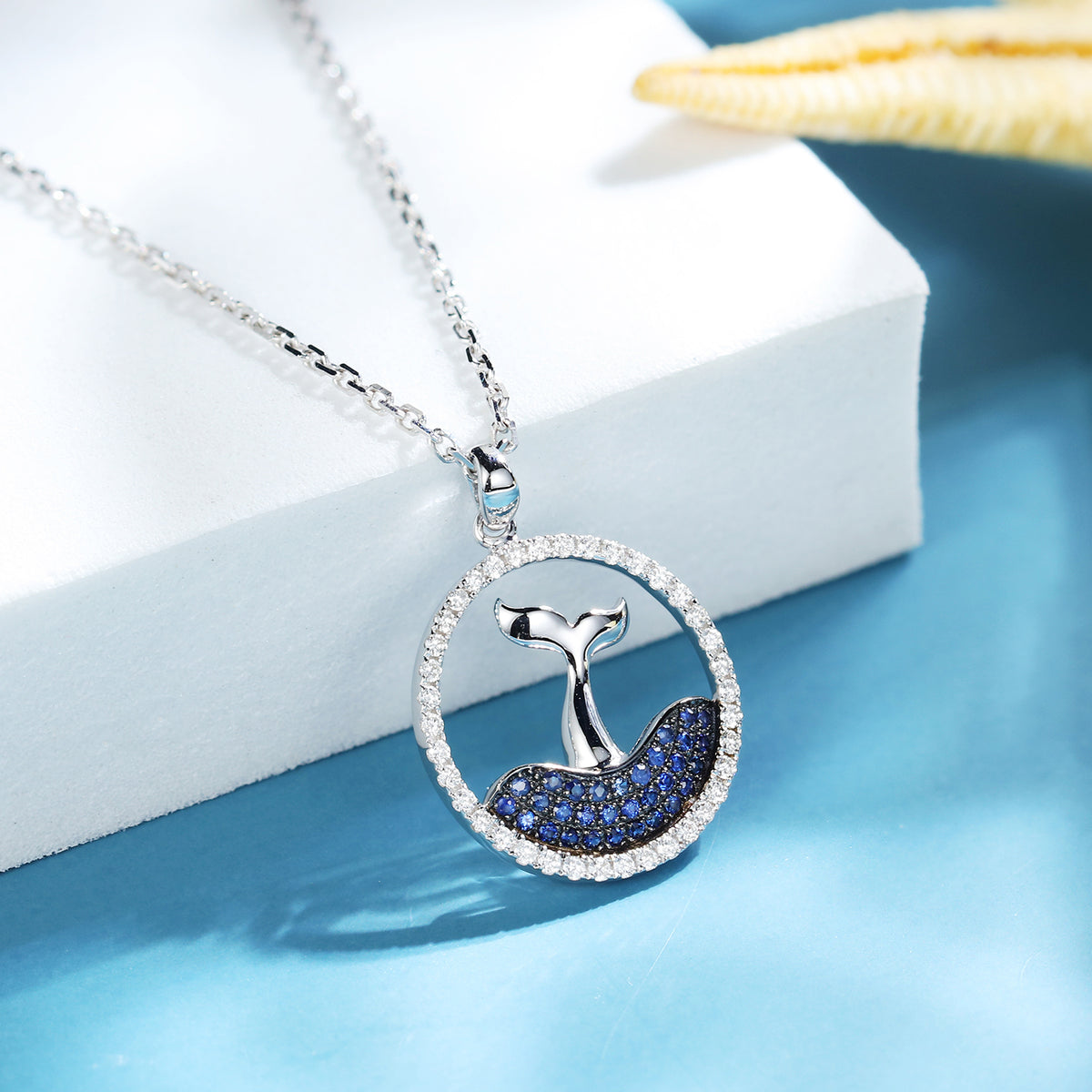 Dolphin tail necklace on sale